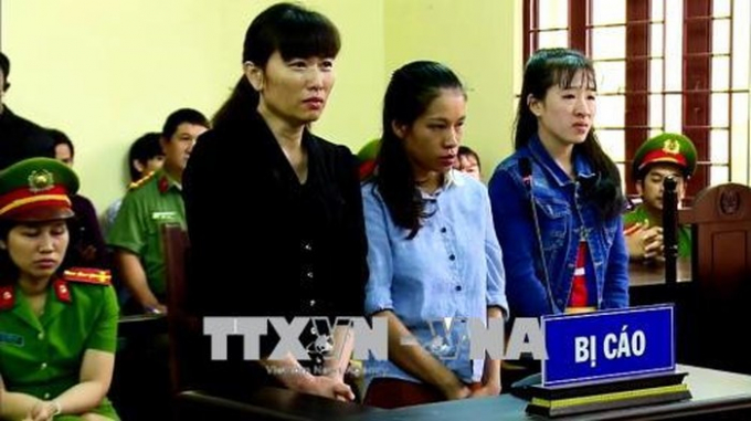 C&aacute;c bị c&aacute;o nghe T&ograve;a tuy&ecirc;n &aacute;n. Ảnh: Th&agrave;nh Chung/TTXVN