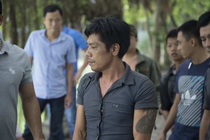 Đối tượng Đỉnh đang thực nghiệm lại hiện trường vụ &aacute;n.