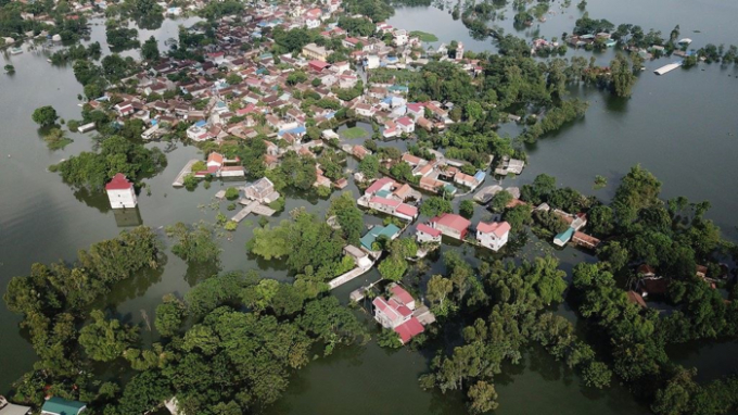 To&agrave;n cảnh x&atilde; Nam Phương Tiến (huyện Chương Mỹ, TP H&agrave; Nội) m&ecirc;nh m&ocirc;ng biển nước nh&igrave;n từ g&oacute;c m&aacute;y ghi h&igrave;nh Flycam.