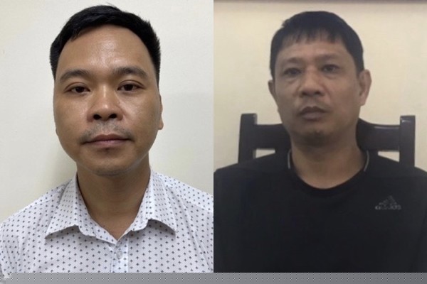 Bùi Quốc Việt (phải) và Võ Việt Hùng. Ảnh: Cổng thông tin Bộ Công an