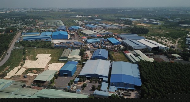Hàng chục doanh nghiệp xây dựng nhà xưởng trong khu đất quy hoạch cụm công nghiệp Phước Tân chưa được cấp phép. (Ảnh: Sỹ Tuyên/TTXVN)
