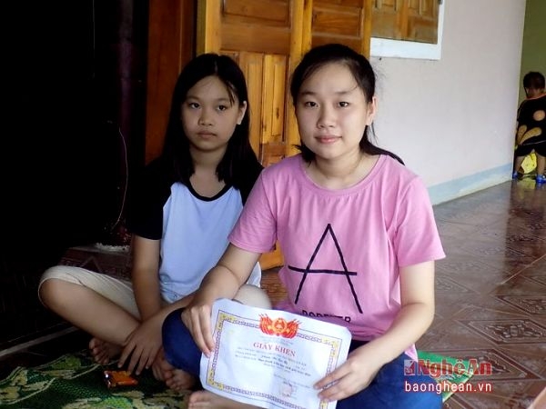 Phạm Thị Tr&agrave; My (phải). Ảnh: B&aacute;o Nghệ An