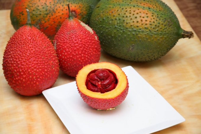 Sử dụng qu&aacute; nhiều gấc sẽ khiến cơ thể ngộ độc. Ảnh: minh họa