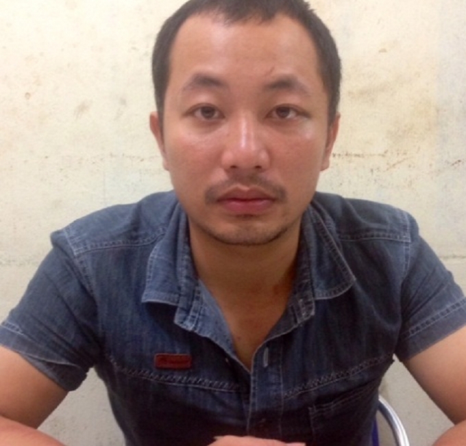 Phạm Quốc Hưng tại cơ quan C&ocirc;ng an.