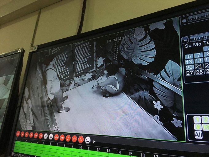 Hai người bị kẹt trong thang m&aacute;y.