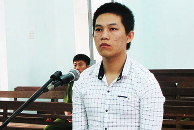 Bị c&aacute;o Nguyễn Quốc Thật tại phi&ecirc;n t&ograve;a. ( Ảnh: B&aacute;o Kh&aacute;nh H&ograve;a).