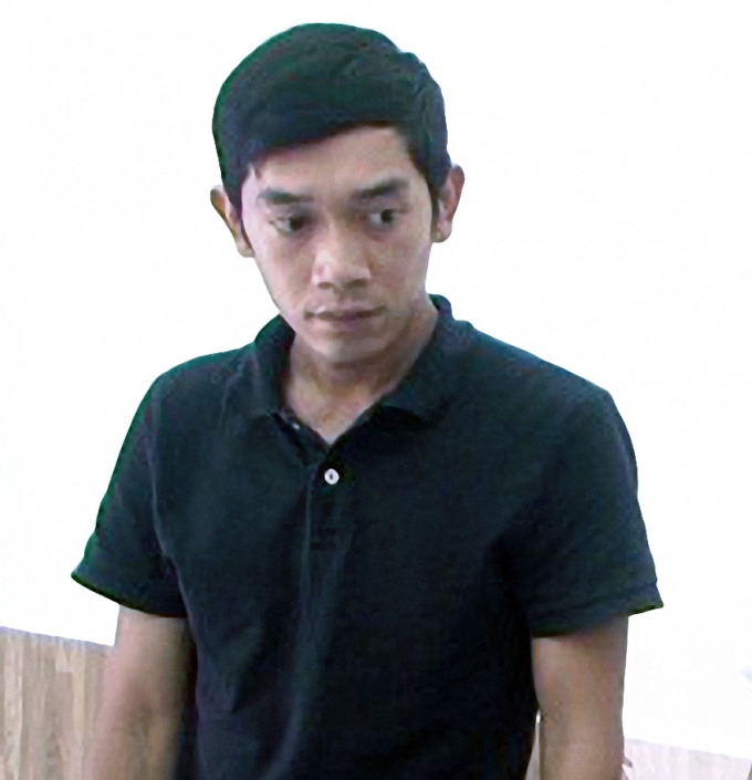 Đối tượng Nguyễn C&ocirc;ng Định đang C&ocirc;ng an tỉnh Gia Lai đọc lệnh bắt