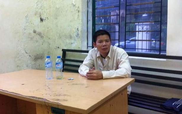 Tạ Đ&igrave;nh Th&aacute;i tại cơ quan c&ocirc;ng an. (Ảnh: b&aacute;o Vietnamnet)