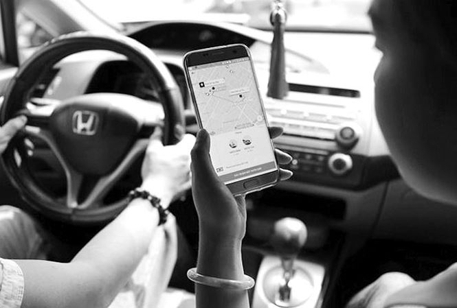 &Eacute;p Grab, Uber như taxi truyền thống l&agrave;m thay đổi bản chất c&ocirc;ng nghệ