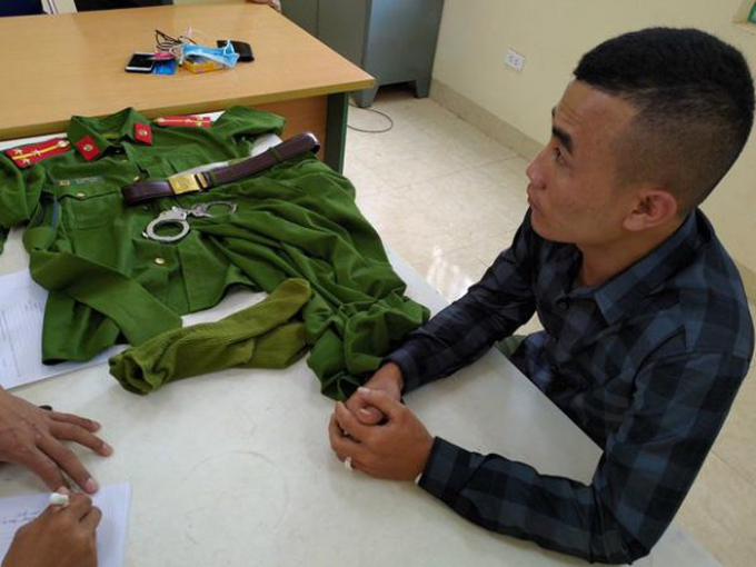 Đối tượng Vì Chấn Hai tại Cơ quan Công an.