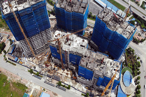 Dịch bệnh bùng phát khiến nhiều dự án bất động sản bị chậm tiến độ. Ảnh minh họa: Tuấn Nguyễn