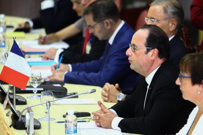 Tổng thống Fran&ccedil;ois Hollande tại buổi hội đ&agrave;m. (Ảnh: Nguyễn Kh&aacute;nh)