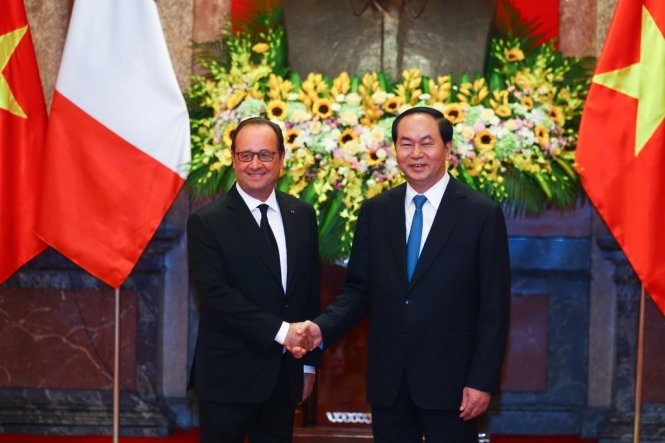Tổng thống Ph&aacute;p Francois Hollande v&agrave; Chủ tịch nước Trần Đại Quang. (Ảnh: Reuters)
