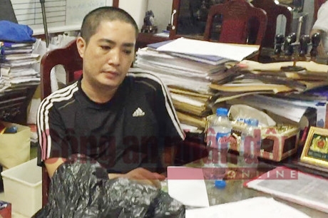 Trịnh Tuấn Anh tại cơ quan c&ocirc;ng an. Ảnh: b&aacute;o C&ocirc;ng an nh&acirc;n d&acirc;n