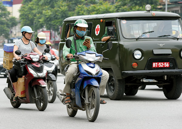 L&aacute;i xe &ocirc;m c&ocirc;ng nghệ Grab