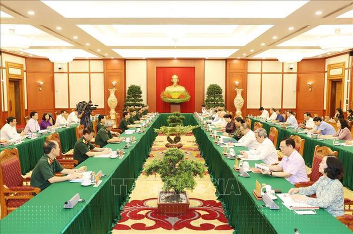 Toàn cảnh buổi làm việc của tập thể Bộ Chính trị với Ban Thường vụ Quân ủy Trung ương. Ảnh: Trí Dũng/TTXVN.