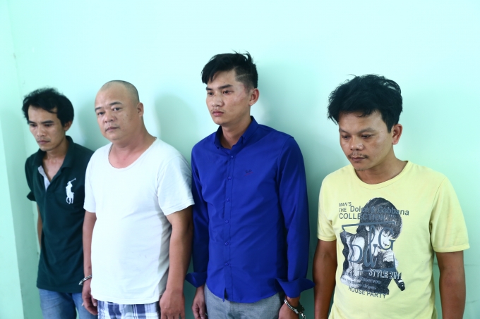 Bốn đối tượng tại cơ quan chức năng.