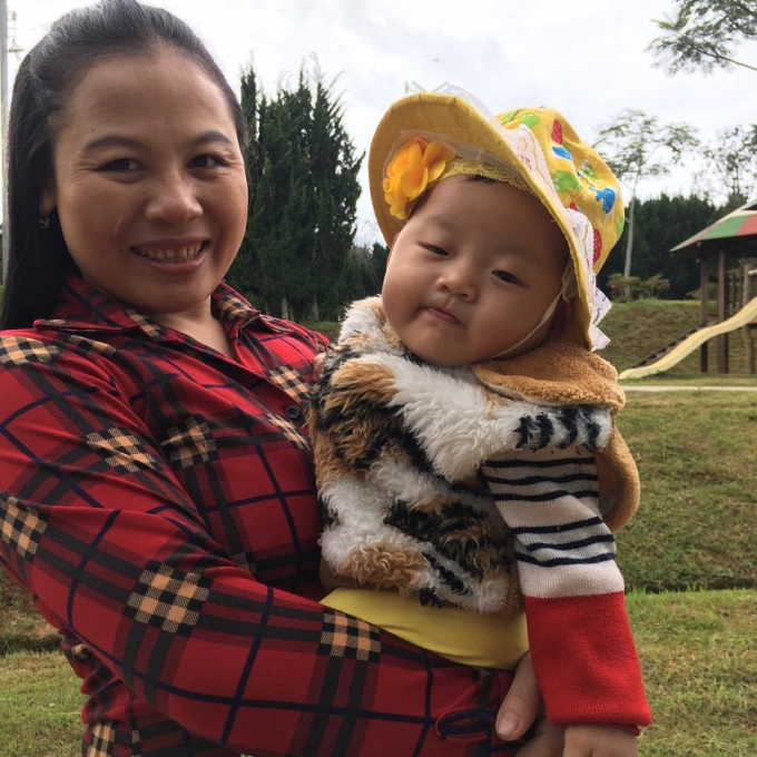 Chị Chu Thị T&aacute;m, người vợ đảm gi&uacute;p anh y&ecirc;n t&acirc;m tập luyện, thi đấu.