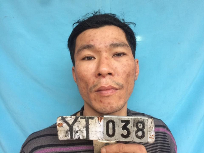 Đặng Quang Vỵ người đ&atilde; d&ugrave;ng dao, lựu đạn chống đối lực lượng chức năng.