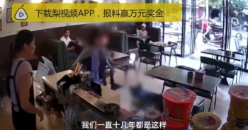 [Clip]: Cô gái bị đánh "bầm dập" trong quán trà sữa vì... va nhẹ vào "chị đại"