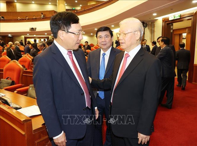 Tổng Bí thư, Chủ tịch nước Nguyễn Phú Trọng với Phó Thủ tướng, Bộ trưởng Ngoại giao Phạm Bình Minh, Chủ tịch UBND Thành phố Hồ Chí Minh Nguyễn Thành Phong tại phiên khai mạc Hội nghị. Ảnh: Trí Dũng –TTXVN