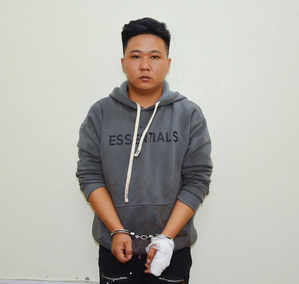 Đối tượng Phan Thanh Ho&agrave;ng tại cơ quan c&ocirc;ng an.