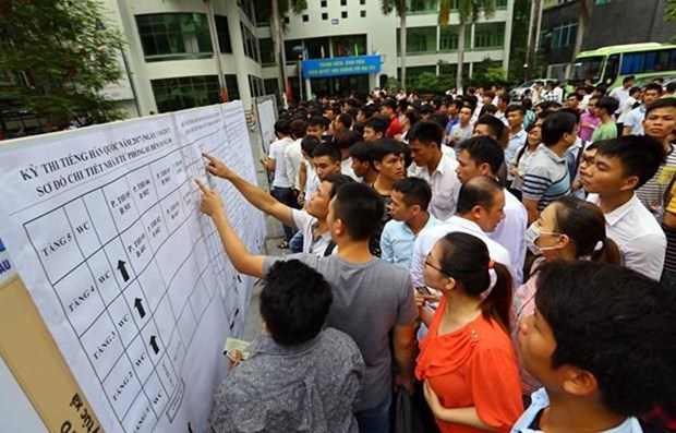 Lao động tham gia kỳ thi tiếng Hàn để đi làm việc tại Hàn Quốc. (Ảnh: PV/Vietnam+)