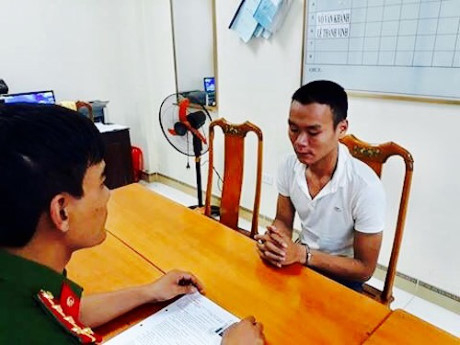 Đối tượng L&ecirc; Th&agrave;nh Đức tại CQĐT. (Ảnh: b&aacute;o An ninh tiền tệ)