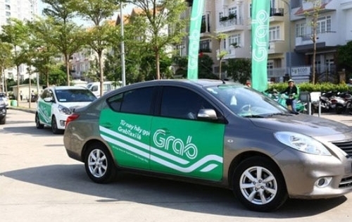 Bộ giao thông yêu cầu xe Uber, Grab dán logo