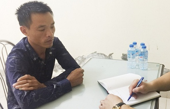 Đỗ Minh Tr&iacute; tại cơ quan c&ocirc;ng an.