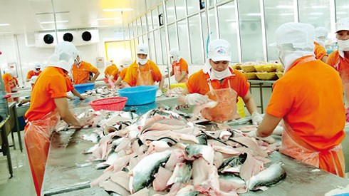 Kim ngạch xuất khẩu ch&iacute;nh thức c&aacute;n mốc 200 tỷ USD. (Ảnh minh họa: KT)