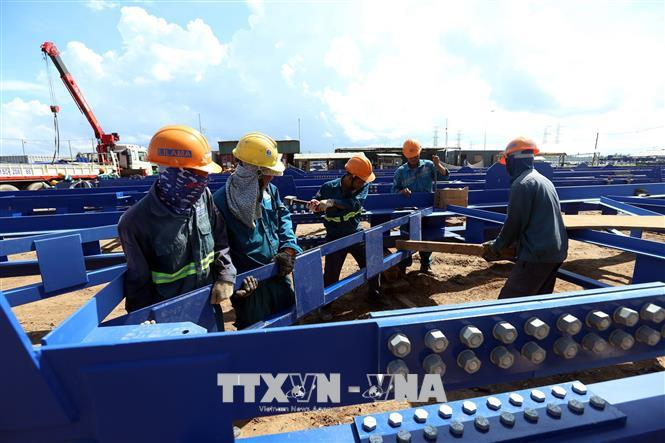 Thi c&ocirc;ng Nhà máy nhi&ecirc;̣t đi&ecirc;̣n Long Phú 1. Ảnh: Huy H&ugrave;ng/TTXVN.