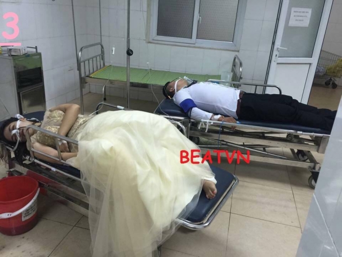 Cặp đ&ocirc;i được đưa đi bệnh viện cấp cứu (ảnh Beatvn).