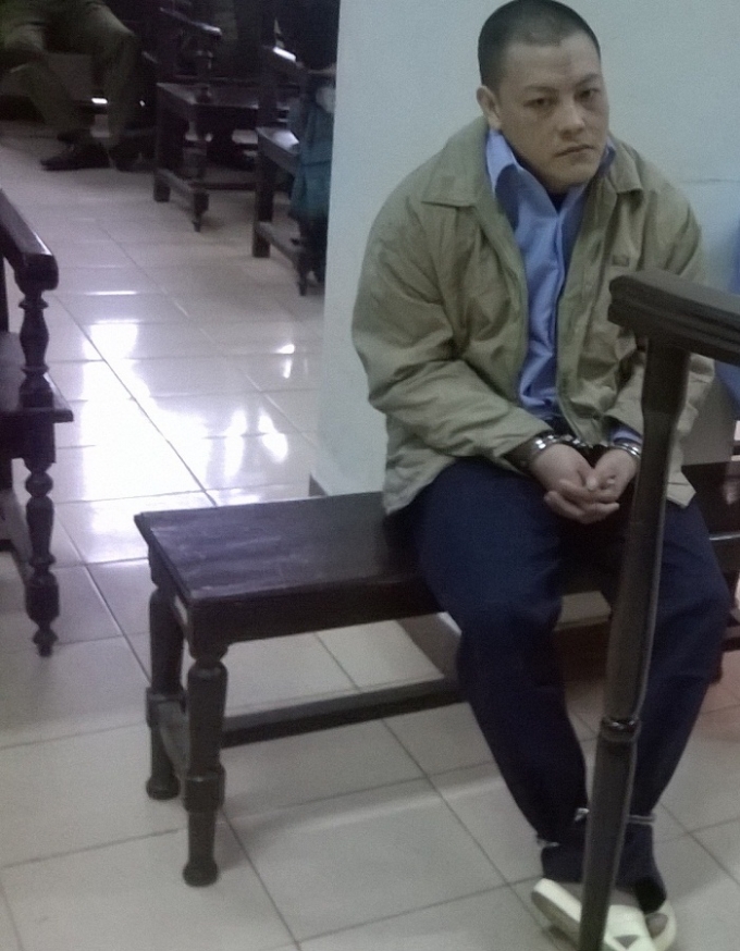 Bị c&aacute;o H&agrave;ng A Phong tại phi&ecirc;n t&ograve;a s&aacute;ng nay 4/12.