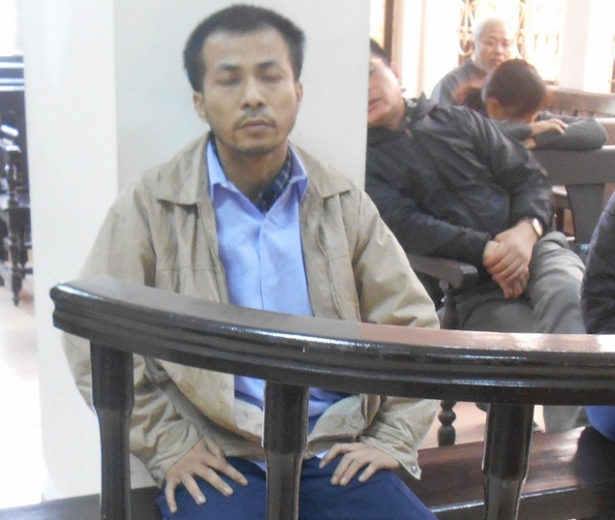 Bị c&aacute;o Đo&agrave;n Quang Sơn tại phi&ecirc;n t&ograve;a s&aacute;ng nay 9/12 (Ảnh: Nguyễn Xinh)