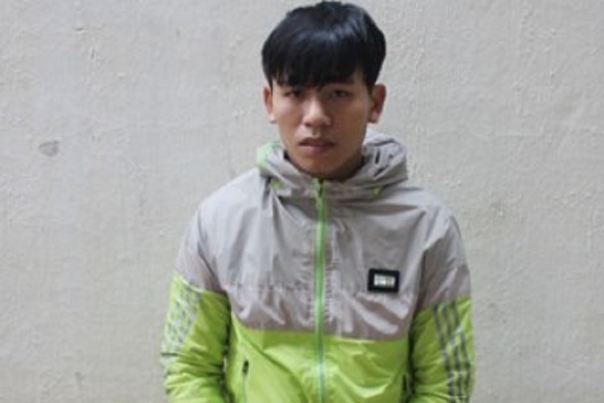 Nguyễn Sỹ Dũng tại cơ quan điều tra. Ảnh T.L