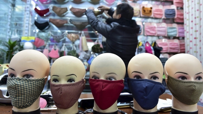 Ch&ugrave;m ảnh th&agrave;nh phố Bắc Kinh ch&igrave;m trong kh&oacute;i m&ugrave; d&agrave;y đặc