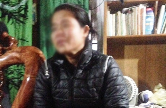 Chị D. tại cơ quan điều tra. Ảnh: L&ecirc; Anh