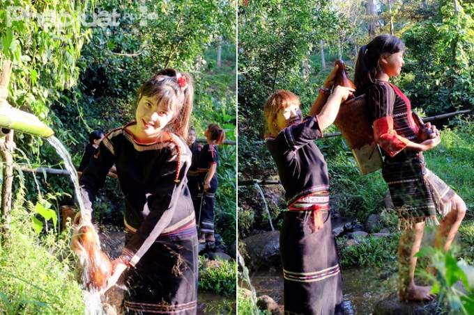 C&aacute;c thiếu nữ &Ecirc; Đ&ecirc; lấy nước bằng quả bầu kh&ocirc; v&agrave; mang bằng g&ugrave;i về nh&agrave;. (Ảnh: Đo&agrave;n Bắc)