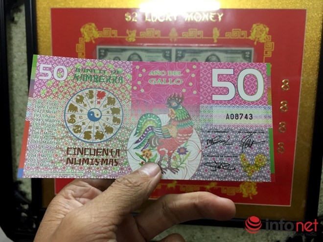 H&igrave;nh ảnh con g&agrave; c&aacute;ch điệu với m&agrave;u sắc sặc sỡ tr&ecirc;n tờ tiền Kamberra c&oacute; mệnh gi&aacute; 50 Numismas của &Uacute;c n&agrave;y được b&aacute;n với gi&aacute; 100 ng&agrave;n đồng.&nbsp;