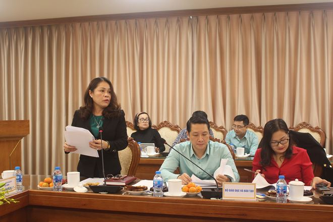 Vụ trưởng Vụ Ph&aacute;p chế L&ecirc; Thị Kim Dung b&aacute;o c&aacute;o kết quả phối hợp năm 2018