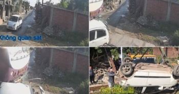 [Clip]: Băng qua đường sắt, ô tô bị tàu hỏa tông "phơi bụng"