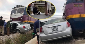 [Clip]: Cố vượt đường ray, ô tô bị tàu hỏa tông "ngang bụng"