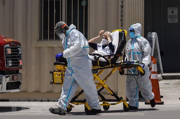 Hàng trăm nghìn người phải nhập viện vì virus SARS-CoV-2 (Nguồn:TTXVN)